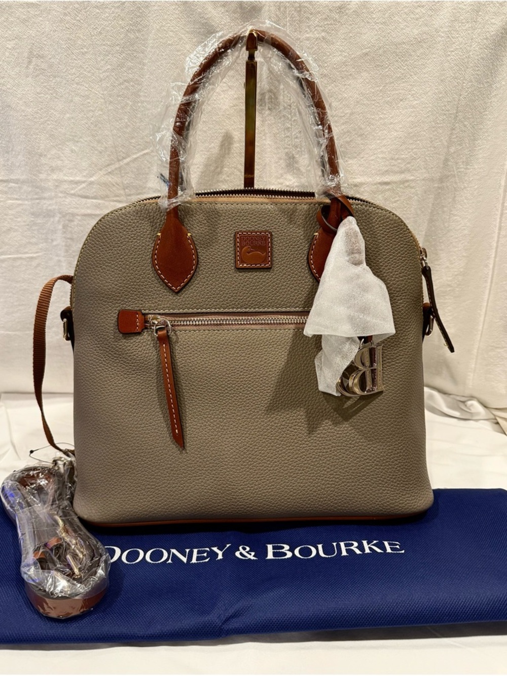 NWT Dooney & Bourke Pebbled Grain Taupe Leather Domed Satchel.